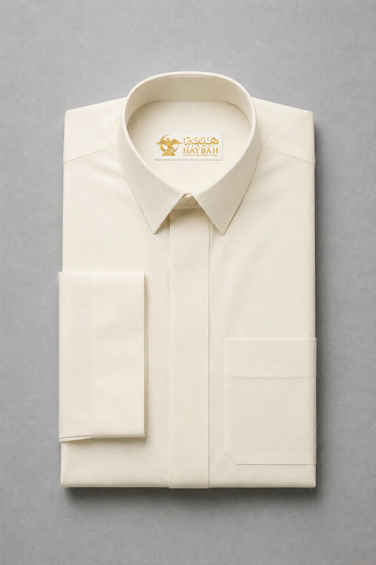 Folded Cream White Signature thobe showcasing premium fabric quality, structured turn down collar and clean craftsmanship for modern men's wear