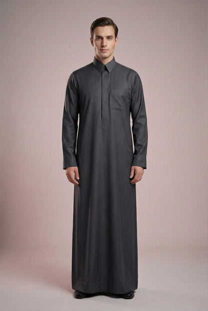 Charcoal Grey Signature Executive Thobe for men featuring a premium turn-down collar, concealed front placket, tailored professional fit, and luxury charcoal grey fabric. Premium Saudi thobe, men's thobe, Islamic clothing, Arabic menswear, ثوب رجالي فاخر, ثوب سعودي رسمي, جلابية رجالية أنيقة, دشداشة رجالية فخمة, luxury modest fashion designed for business professionals, Eid celebrations, Friday prayer, weddings, Ramadan gatherings, and sophisticated everyday wear.