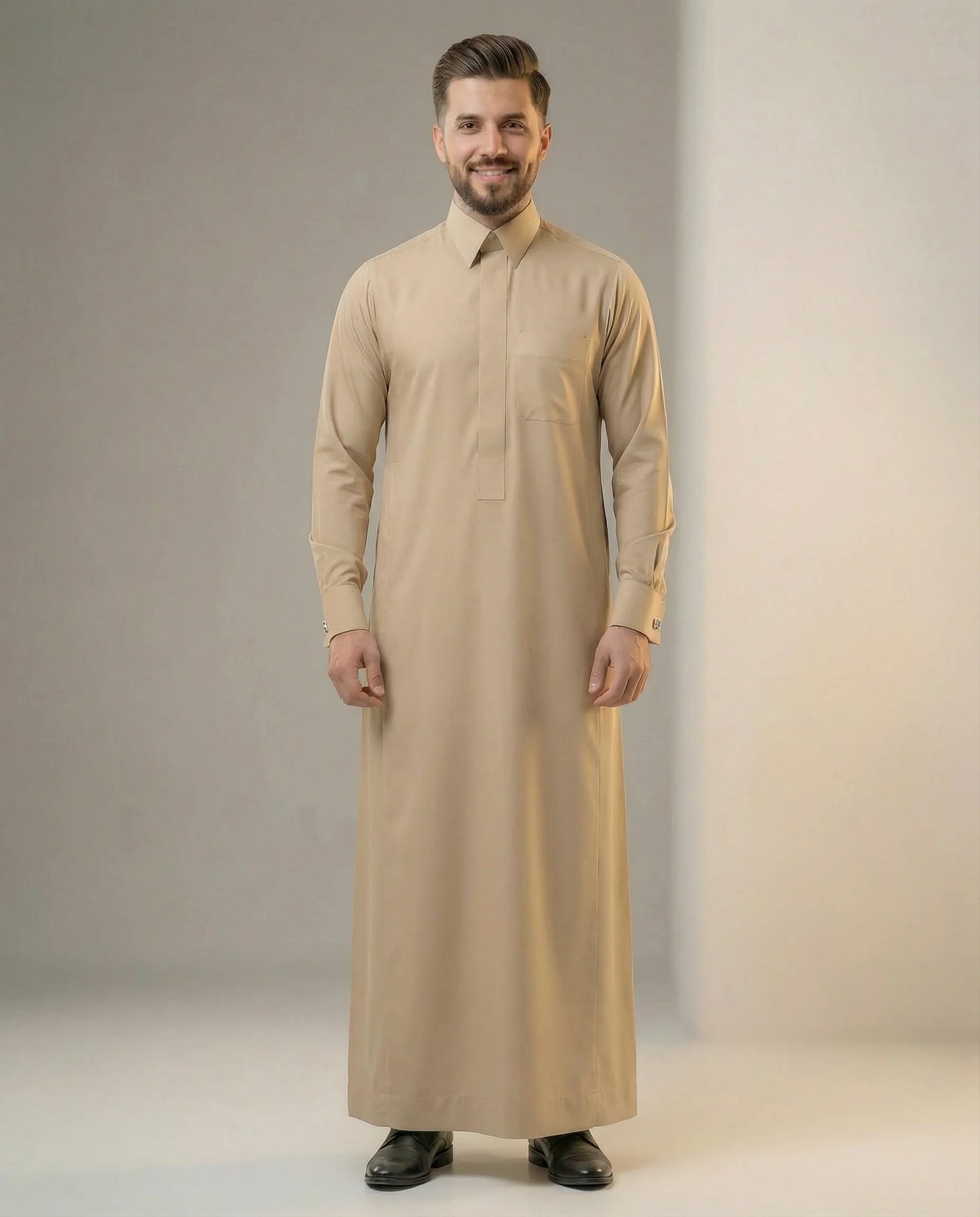 Desert Beige Executive Thobe – Luxury Formal Edition by Haybah featuring a refined desert beige color, concealed front placket, structured turn-down collar, premium breathable fabric, elegant executive tailoring, and timeless Gulf sophistication designed for formal occasions, business meetings, weddings, Eid celebrations, Friday gatherings, and modern gentlemen seeking understated luxury. ثوب بيج صحراوي فاخر يجمع بين الأناقة التنفيذية والفخامة الخليجية الراقية للمناسبات الرسمية والاجتماعات والاحتفالات الخاص