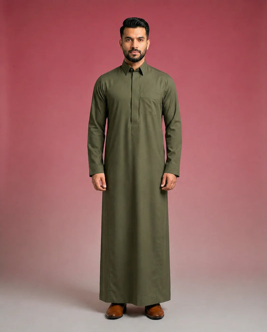 Olive Green Premium Thobe Timeless Structured Fit for men featuring premium tailoring, concealed front placket, elegant shirt collar, breathable luxury fabric, and rich olive green finish. Luxury Saudi thobe, men's thobe, Islamic clothing, Arabic menswear, ثوب رجالي, ثوب سعودي, ثوب أخضر زيتوني, ثوب زيتي رجالي, ثوب فاخر للرجال, جلابية رجالية أنيقة, دشداشة رجالية راقية, ملابس إسلامية رجالية, premium modest fashion suitable for work, prayer, Ramadan, Eid celebrations, family gatherings, and distinguished every