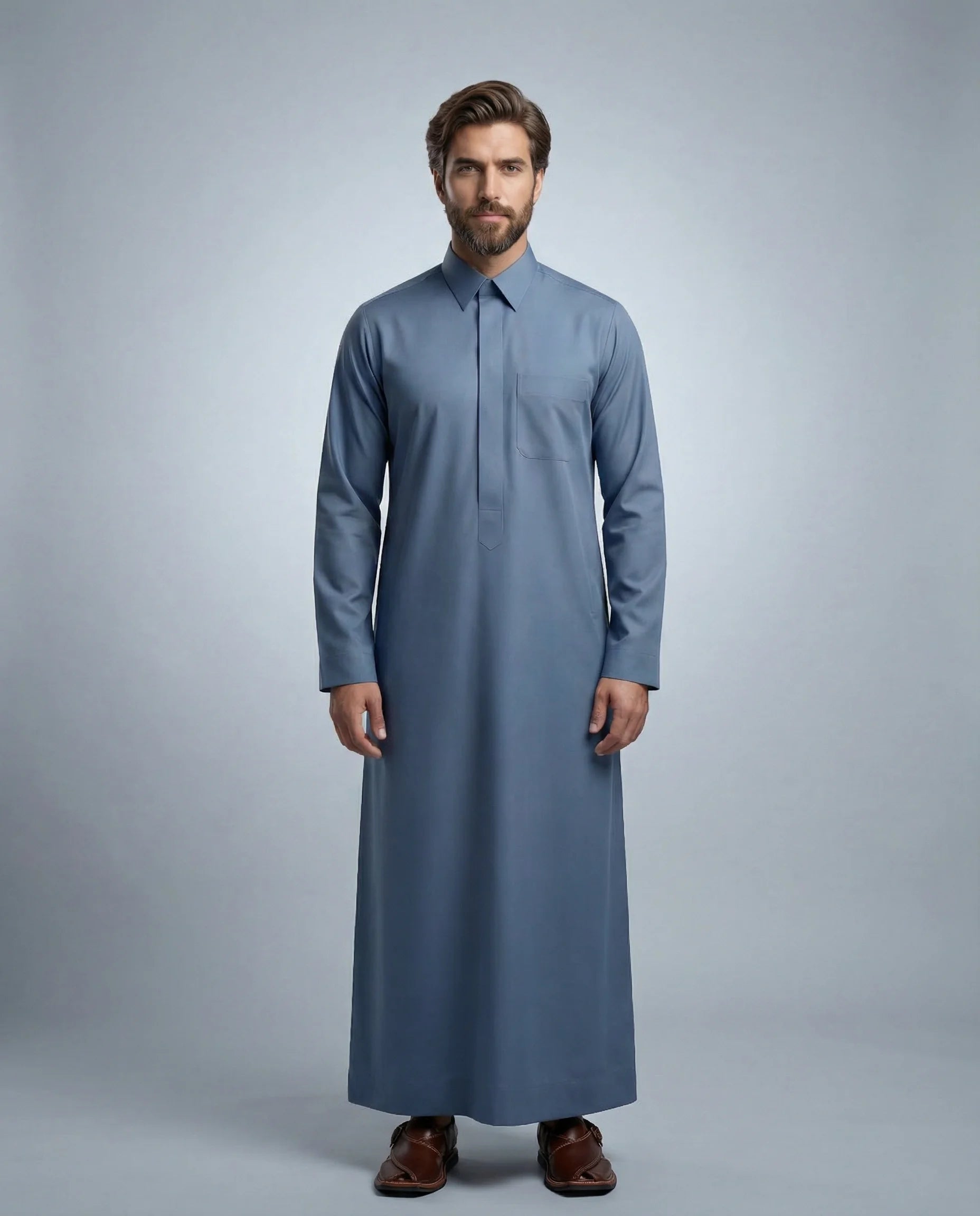 Steel Blue Classic Thobe Modern Everyday Confidence for men featuring premium tailoring, structured turn-down collar, concealed front placket, breathable luxury fabric, and refined steel blue finish. Luxury Saudi thobe, men's thobe, Islamic clothing, Arabic menswear, ثوب رجالي, ثوب سعودي, ثوب أزرق فولاذي, ثوب رجالي فاخر, جلابية رجالية أنيقة, دشداشة رجالية, ثوب رسمي للرجال, premium modest fashion designed for daily wear, business settings, Eid celebrations, Ramadan gatherings, Friday prayer, and sophisticate