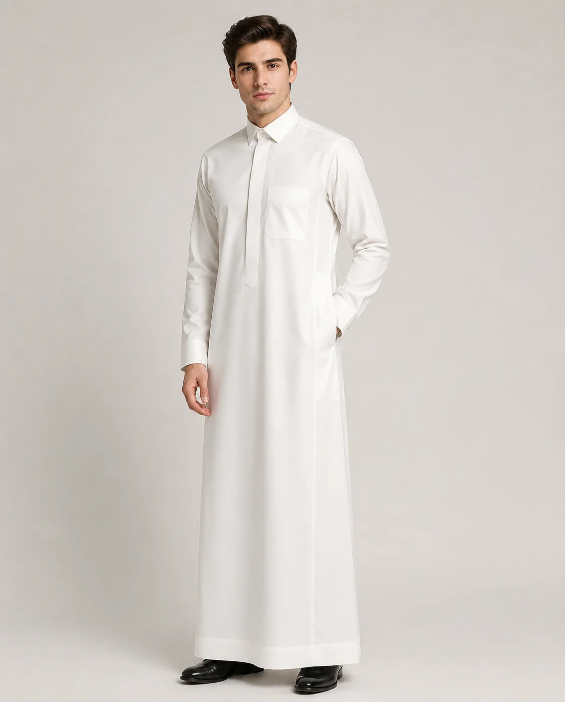 Pearl White Classic Saudi thobe for men featuring a modern tailored fit, premium fabric, concealed placket design and long sleeves, front view