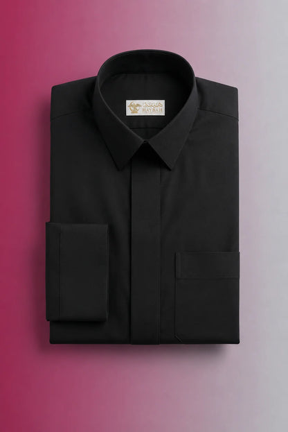 Folded Carbon Black Executive Thobe showcasing premium craftsmanship, concealed placket, structured collar, chest pocket detailing, and breathable luxury fabric. Luxury Saudi thobe, men's premium jubba, Islamic clothing for men, ثوب كربوني أسود فاخر, ثوب سعودي راقٍ, جلابية رجالية أنيقة, دشداشة رجالية فخمة, premium Arab menswear for Ramadan, Eid, prayer, and everyday sophistication.