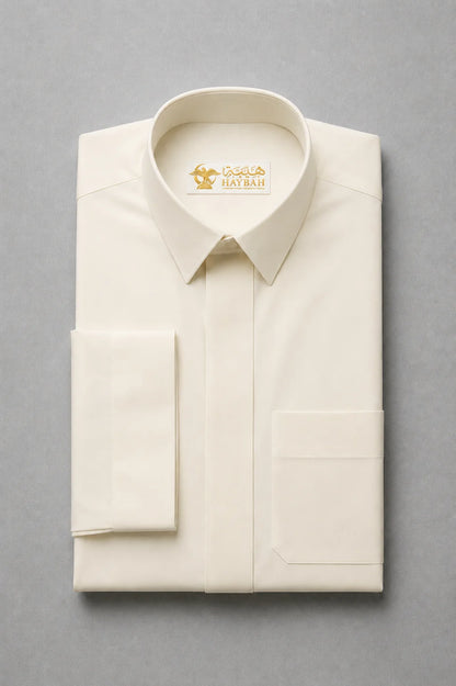 Folded Cream White Signature thobe showcasing premium fabric quality, structured turn down collar and clean craftsmanship for modern men's wear