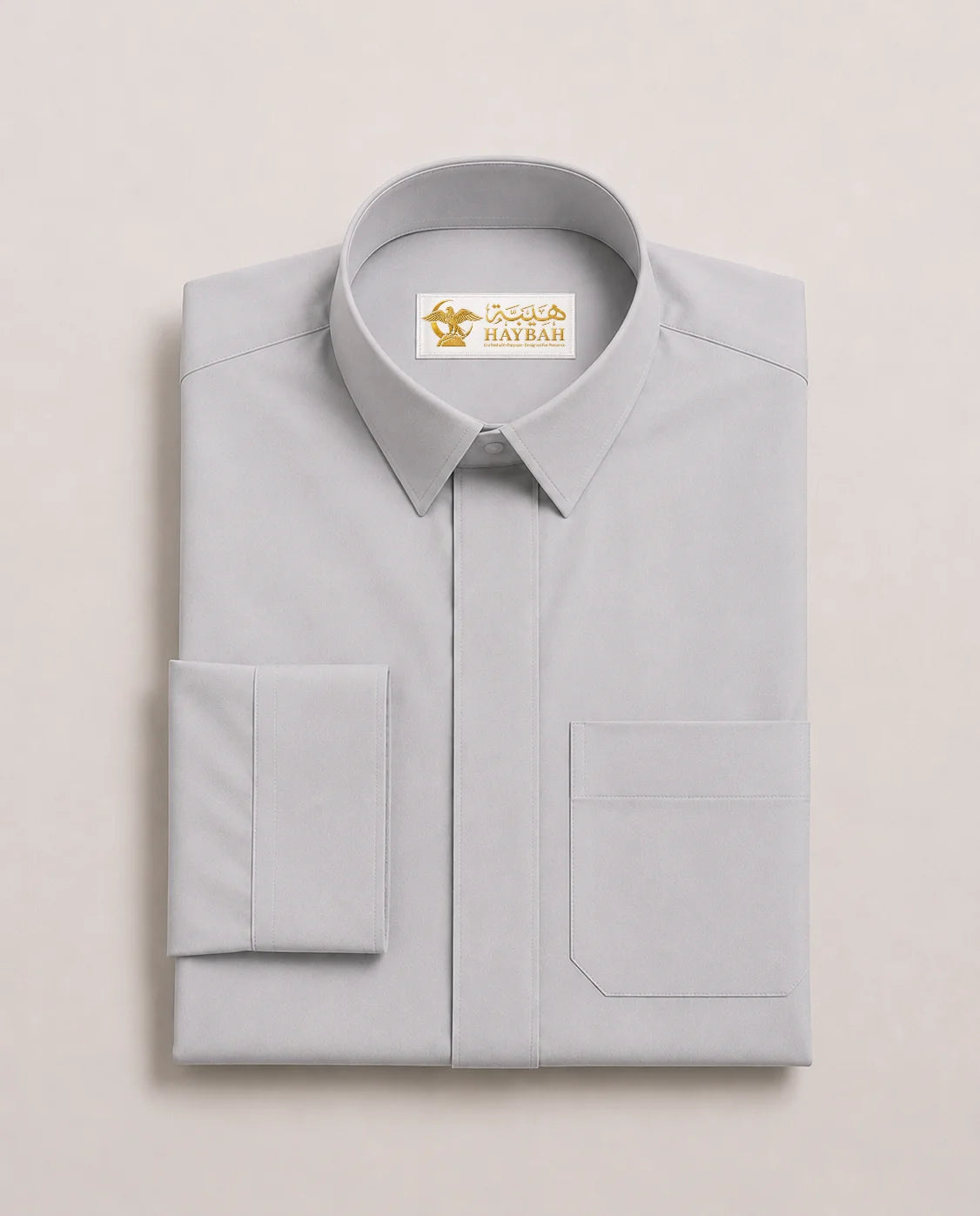 Folded Light Grey Saudi Thobe with Turn-Down Collar – Premium Men's Islamic Clothing with Refined Everyday Design