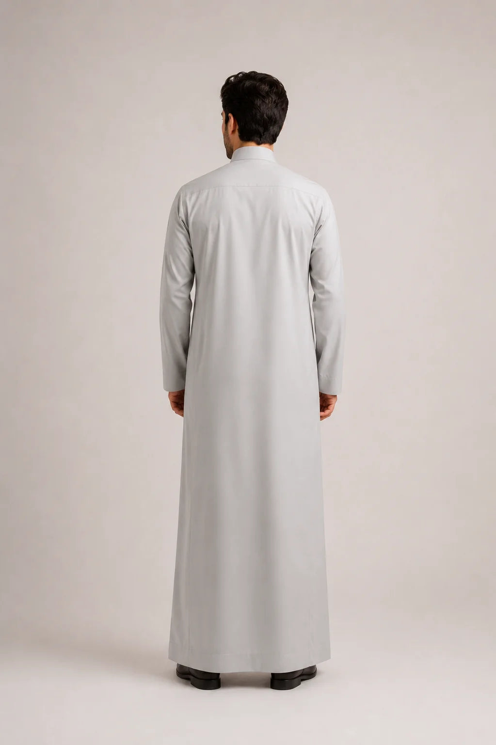 Back View of Light Grey Saudi Thobe for Men Showcasing Clean Tailored Fit and Elegant Traditional Craftsmanship