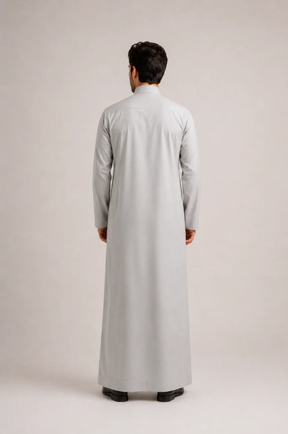 Back View of Light Grey Saudi Thobe for Men Showcasing Clean Tailored Fit and Elegant Traditional Craftsmanship