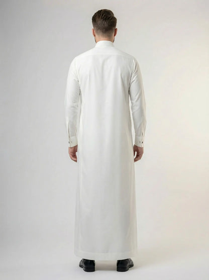 Back view of Pearl White Luxury Thobe highlighting clean tailoring, graceful fabric drape, balanced silhouette, premium construction, and sophisticated Gulf formal wear styling ideal for Eid, Jummah, weddings, nikah ceremonies, and executive occasions. منظر خلفي لثوب أبيض فاخر يظهر الانسيابية الأنيقة والتفصيل الاحترافي والمظهر الراقي المناسب للمناسبات المميزة.
