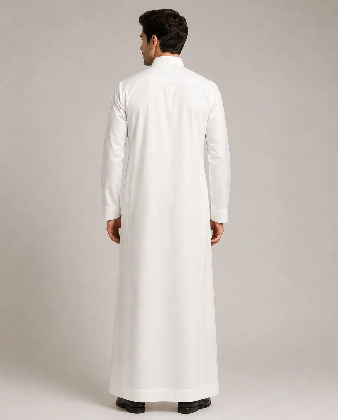 Back view of Pearl White Classic Saudi thobe for men showing clean tailored drape, long sleeves and premium traditional design