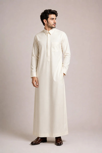 Side profile of Cream White Signature men's thobe featuring a structured turn down collar, premium fabric and refined everyday elegance