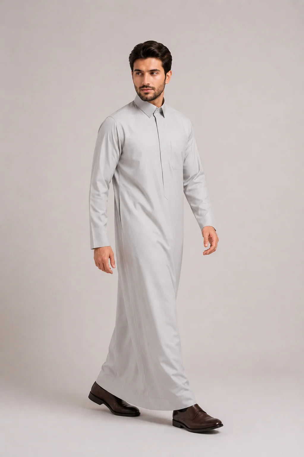 Side Pose of Light Grey Saudi Thobe for Men Featuring Modern Tailored Silhouette and Comfortable Everyday Wear