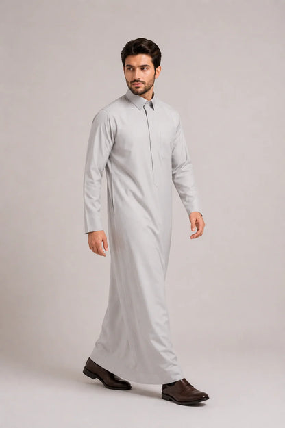 Side Pose of Light Grey Saudi Thobe for Men Featuring Modern Tailored Silhouette and Comfortable Everyday Wear