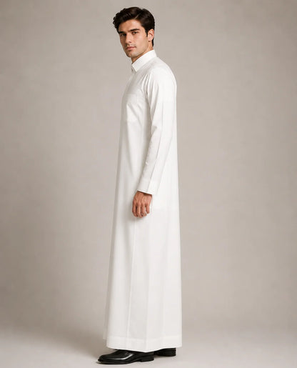 Side profile of Pearl White Classic men's thobe featuring streamlined fit, premium fabric and traditional Saudi Arabian styling