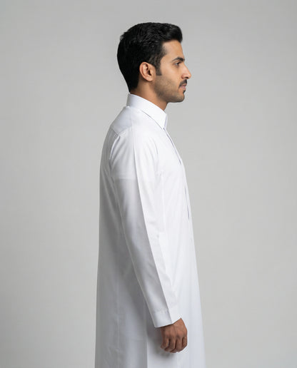 Side profile of Haybah Pure White Classic thobe with turn down collar, modern tailored fit and premium white fabric construction