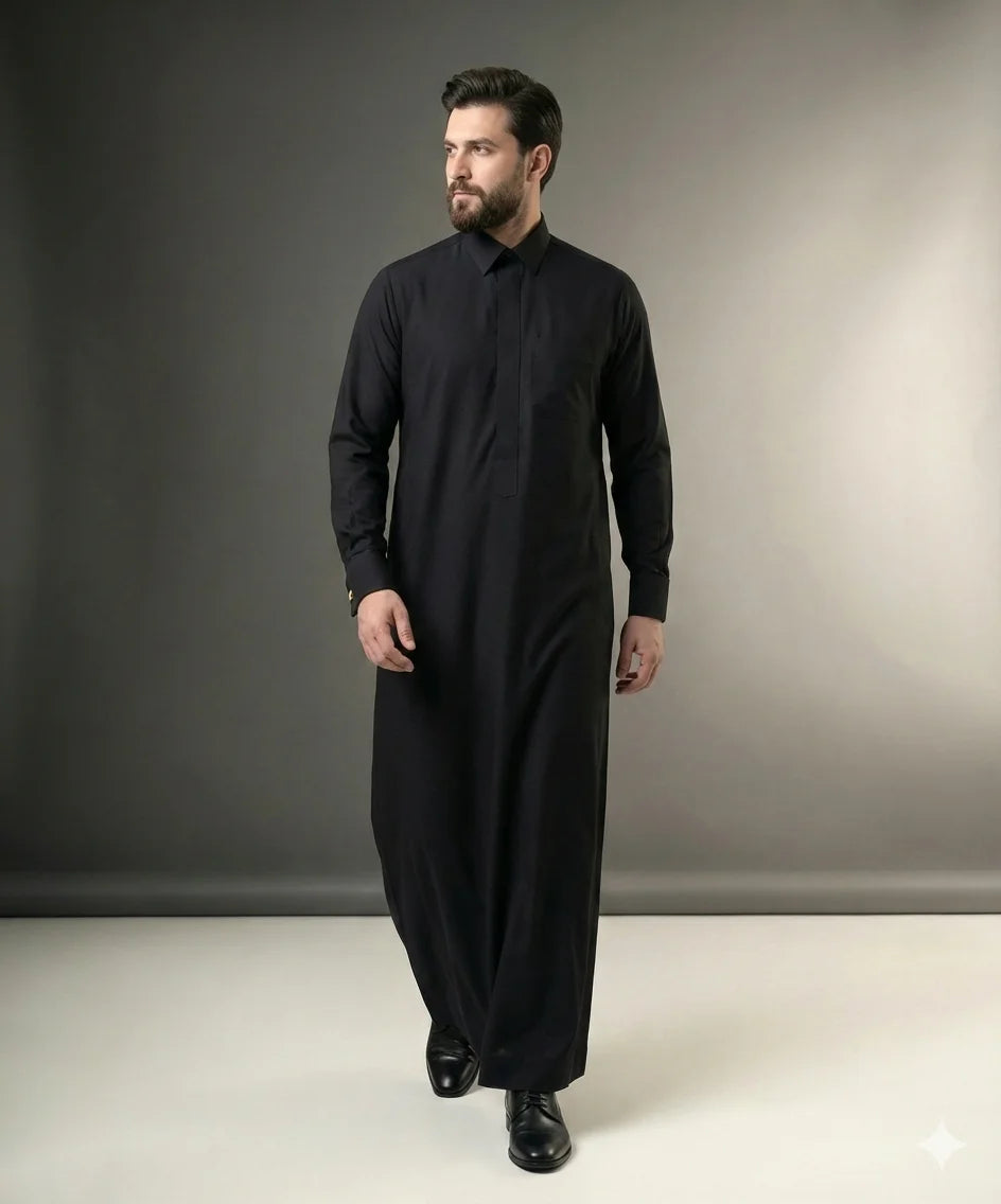 Walking view of Deep Black Luxury Thobe displaying confident movement, royal elegance, premium tailoring, executive sophistication, and luxurious Gulf-inspired occasion wear ideal for weddings, Eid celebrations, formal receptions, business functions, and prestigious events. إطلالة أثناء المشي لثوب أسود فاخر تعكس الثقة والهيبة والرقي في المناسبات الرسمية والاحتفالات الفاخرة.