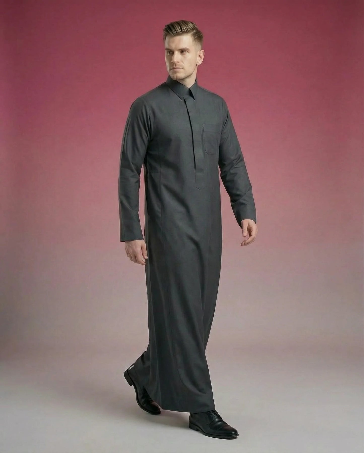 Smoke Black Classic Thobe Premium Everyday Wear featuring concealed front placket, premium tailoring, breathable fabric, elegant shirt collar, and modern Saudi-inspired design. Luxury Saudi thobe, men's Islamic clothing, premium jubba, ثوب سعودي رجالي فاخر, ثوب أسود كلاسيكي, ثوب فحمي أنيق, ثوب رسمي للرجال, جلابية رجالية كلاسيكية, دشداشة رجالية حديثة, modest fashion ideal for Jummah prayer, work, Eid celebrations, Ramadan gatherings, and everyday sophistication.