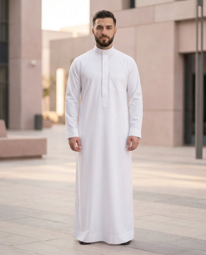 Luxury Ready White Signature Saudi Thobe for Men in Contemporary Urban Setting – Premium Islamic Clothing for Modern Gentlemen