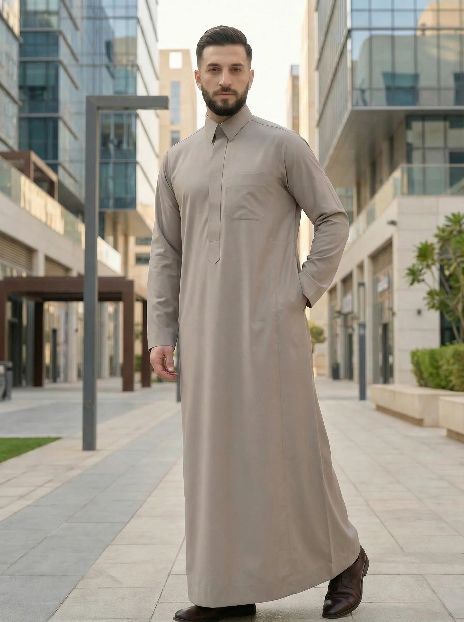 Luxury Sand Grey Saudi Thobe for Men in Modern Urban Lifestyle Setting – Sophisticated Islamic Wear for Everyday Refinement